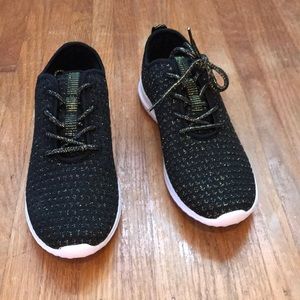 Black and gold sneakers